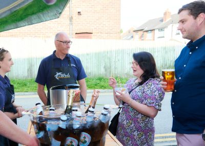 Chatting with a large gin at the Copa Fizz mobile bar during an outdoor corporate event
